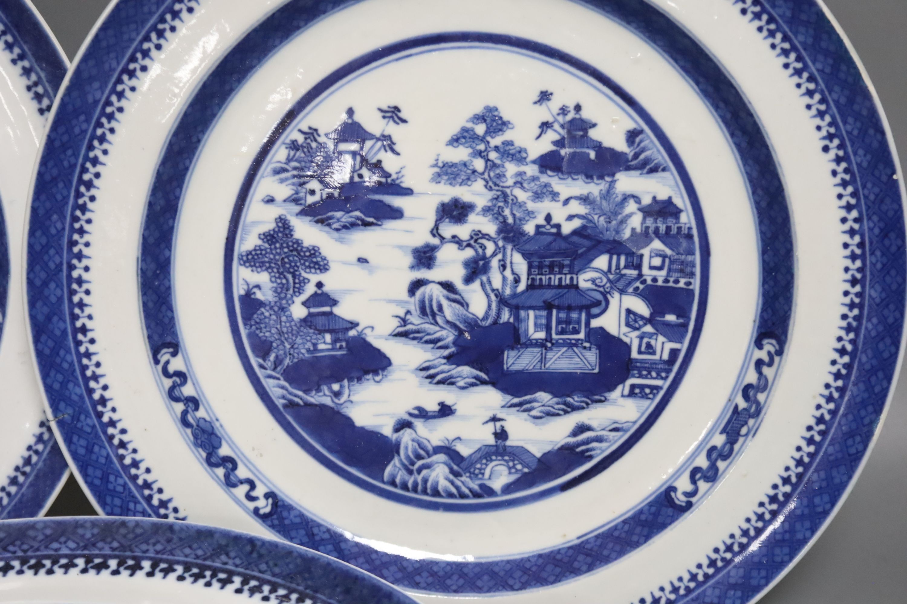 A set of seven 19th century Chinese blue and white plates, diameter 25cm